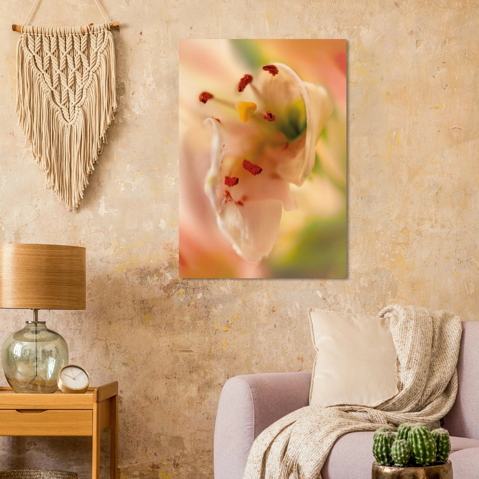 Close-up soft pink lily with red stamens and yellow pistil against a dreamy green and rose bokeh background, bohemian mindful living room