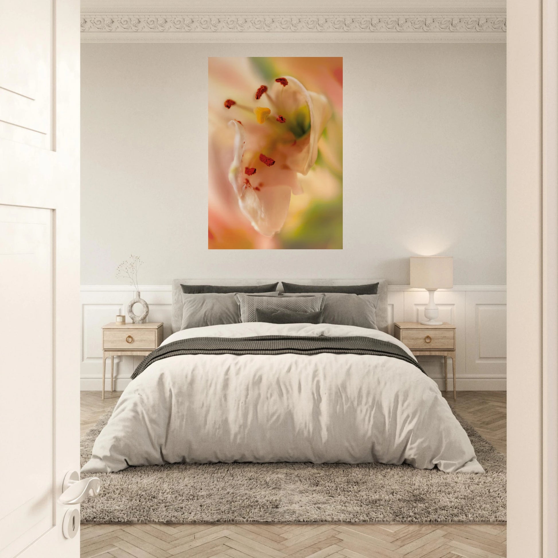 Close-up soft pink lily with red stamens and yellow pistil against a dreamy green and rose bokeh background, mindful bedroom